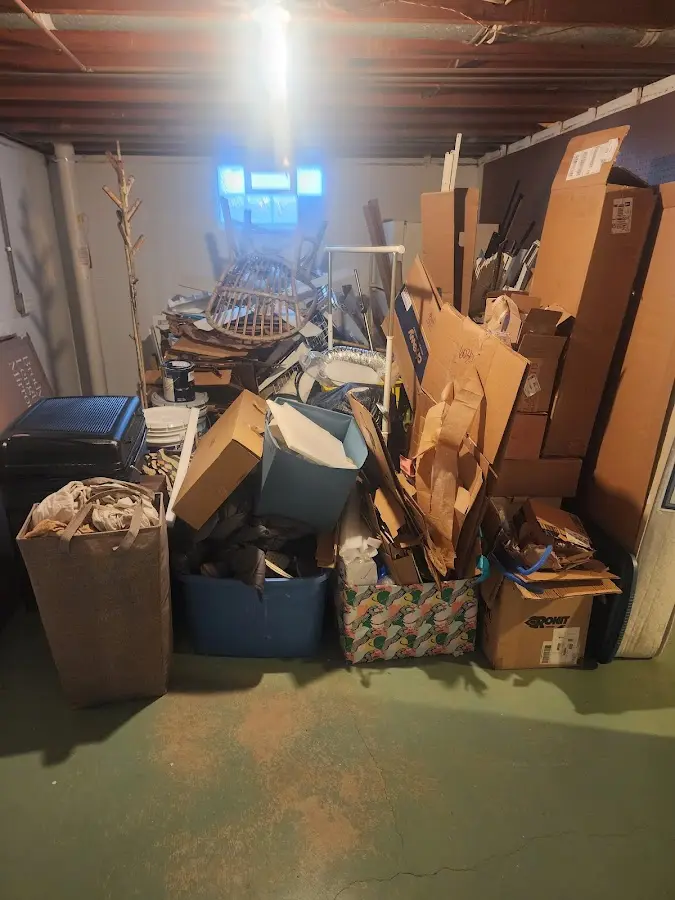 Roll-off dumpster container at job site for 2 Yard Dumpster Rental in Hopkinton